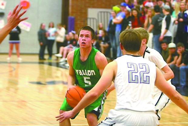 Fallon guard Tyler Bagby goes up for a shot during Friday&#039;s game at Spring Creek.