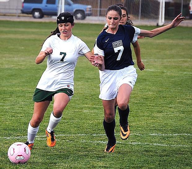 Fallon&#039;s Rebecca Mills, left, battles Alliso Wright of North Tahoe for the ball during the Lady Wave&#039;s 4-0 win Wednesday at the Edward Arciniega Complex. The Lady Wave visit Spring Creek today.