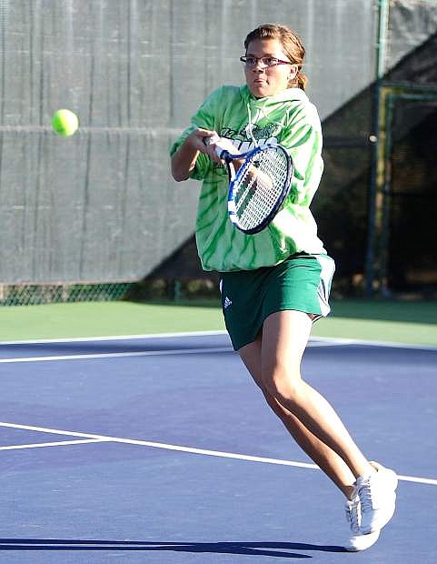 Fallon senior tennis player Becky Conner returns a shot during the Northern Division I-A regional team tournament last week in Truckee. The Lady Wave lost in the regional final, 16-2, to South Tahoe.