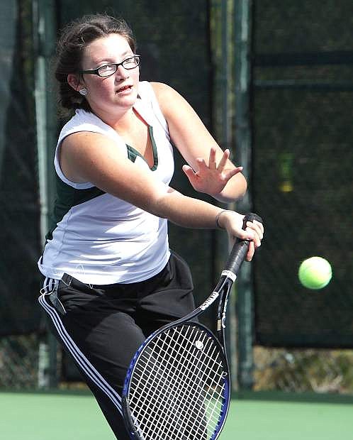 Lady Wave singles player Lindsey Golding returns a shot during her loss to Incline&#039;s Allison Tong at the Northern Division I-A regional tennis tournament last weekend in Truckee.