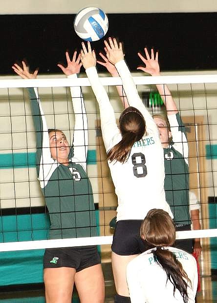 Fallon&#039;s Ali Tedford (5) and Izzy Thomas (3) try to block North Valleys&#039; pass attempt at the net during Thursday win in Reno. The Lady Wave also won the Lassen (Calif.) Tournament on Saturday.