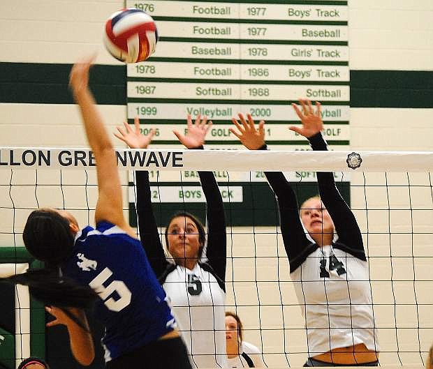 Fallon&#039;s Ali Tedford, middle, and Megan McCormick, right, were selected to the second-team and honorable mention, respectively, All-North team.