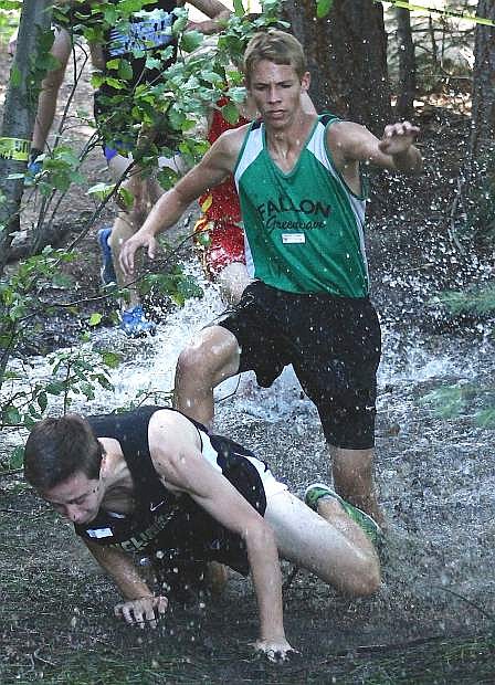 Fallon junior Tristen Thomson avoids an Incline runner after crossing a stream during last week&#039;s Whittell Invitational.