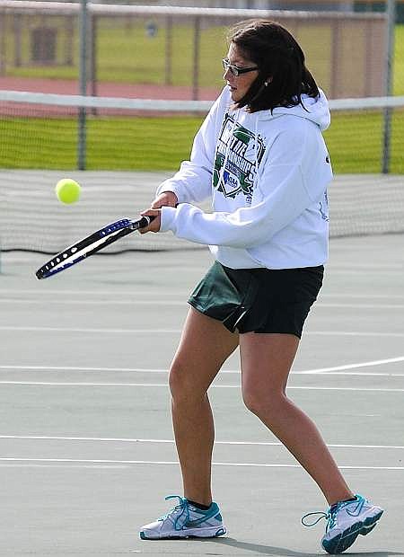 Lady Wave No. 1 singles player Sarah Inglis hits a backhand during Fallon&#039;s win over Truckee on Tuesday.