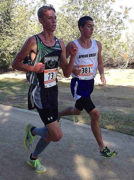 Fallon&#039;s Tristen Thomson, left, runs alongside Spring Creek&#039;s Devin Hager during the Division I-A state cross country meet on Saturday in Las Vegas. Thomson finished 15th with a time of 17:39.8.