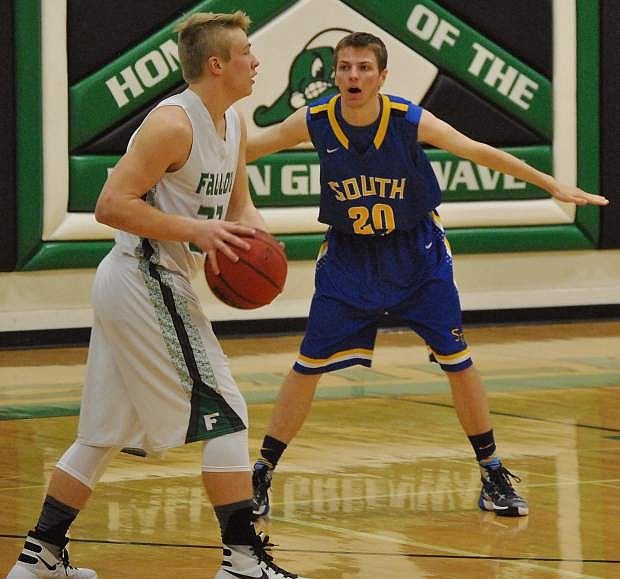 The Wave&#039;s Cade Vercellotti (22) looks to pass while guarded.