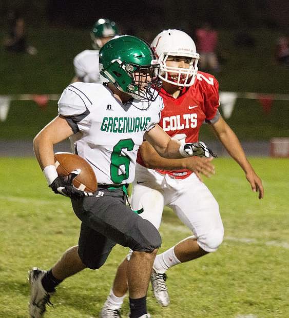 Fallon&#039;s Brock Uptain, left, outraces Wooster&#039;s Genaro Cortez in the first half of their game last week. Fallon entertains South Tahoe today at 7 p.m.