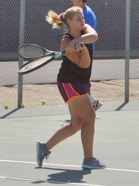 Fallon&#039;s Kayla Bekiares makes contact with the ball during the Lady Wave tennis team&#039;s practice.