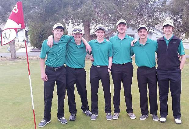 The Greenwave varsity boys golf team poses for a photo after taking first place in the Hawthorne Tournament of 13 schools competing.