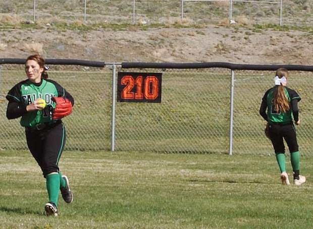 Fallon&#039;s Caitlyn Welch fields a play from shortstop.
