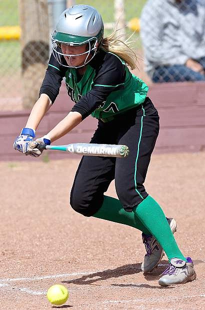 Fallon&#039;s Izzy Thomas bunts at bat in the Lady Wave&#039;s series at Dayton.