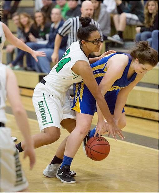 Fallon&#039;s Leta Otuafi, left, plays hard defense in the Wave&#039;s game against Lowry.