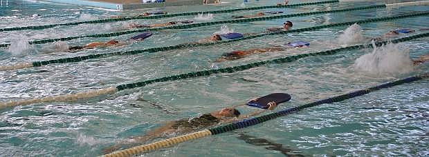 The Greenwave varsity swim team practices in the Churchill County pool after their first meet this weekend in Fallon.