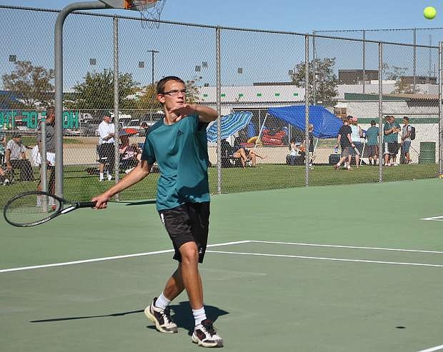 Fallon junior Thomas Jamieson steps up to return the serve from Incline on Tuesday.