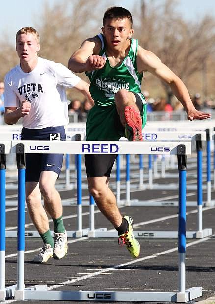 Fallon&#039;s Reid Clyburn, front, competes in the 110 hurdles in the frosh/soph division.