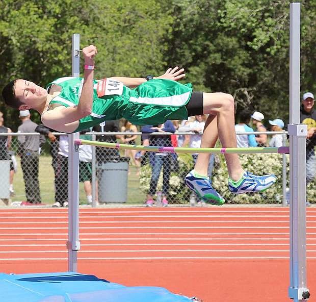 Freshman Justin Cathey competes in the high jump at the Del Oro invitational on Friday.