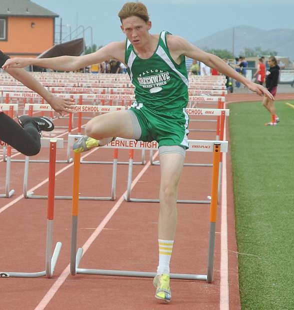 Fallon&#039;s Davis Koenig competes in the 100 hurdles on Friday at Fernley.