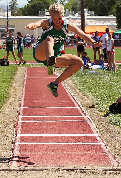 Fallon&#039;s Whitney Skabelund jumps for a new record in the triple long jump.