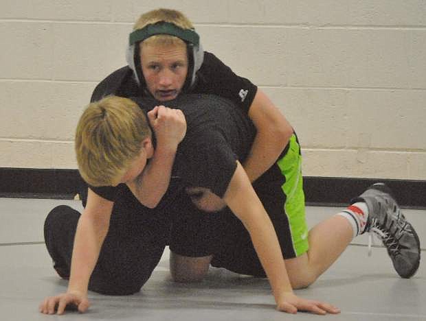 Fallon&#039;s Terry White, top, wrestles Sean McCormick after several wins at the Arbor View Tournament in Las Vegas.