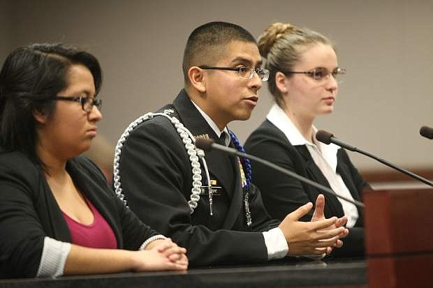 Carson High School seniors Lydia Lopez, Victor Quispe and Vanessa Rauch present during the We the People state finals at the Nevada Legislature.
