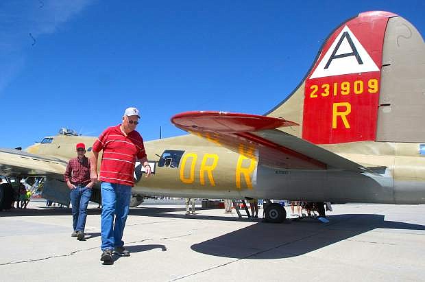 Carson City residents Neil Sharp and Denny Swain check out a B-17 Flying Fortress that was on display for The Wings of Freedom Tour at the Minden-Tahoe airport on Tuesday. The tour continues today until 12 noon.