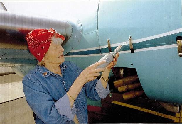 Ruthie Strand portrays Rosie the Riveter.