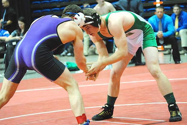Wave wrestler Trae Workman, right, was on of three Fallon grapplers to win a state championship on Saturday.