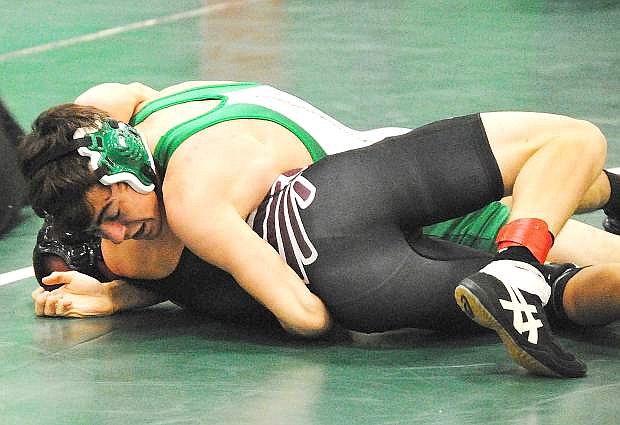 Fallon grappler Clay Amezquita works for a pin during a tournament this season. The Greenwave will compete today and Saturday at the annual Reno Tournament of Champions.