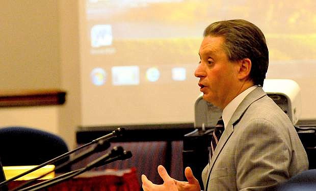 Fiscal Analyst Russ Guindon testifies at the Nevada Economic Forum meeting on Friday.