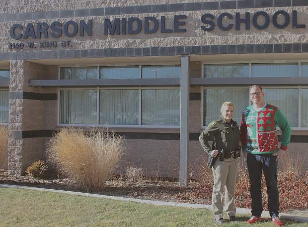 Carson City Deputy Jessica Chrzanowski,left, stands in front of Carson Middle School with principal Dan Sadler. Chrazanowski is one of three new School Resource Officers in the school district, where she will stay at the school to keep students safe.