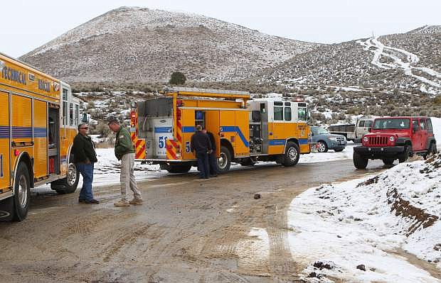 Fire and Sherrif&#039;s Dept. personnel gather at Goni Rd. Wednesday afternoon after a man was found in a truck that left the roadway and traveled approximately 400 feet. over the edge. Both departments say their services will continue to improve in 2016.