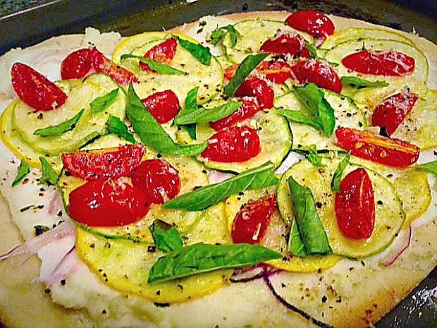 Buy the dough or roll your own, summer squash pizza is full of the tastes of the season.