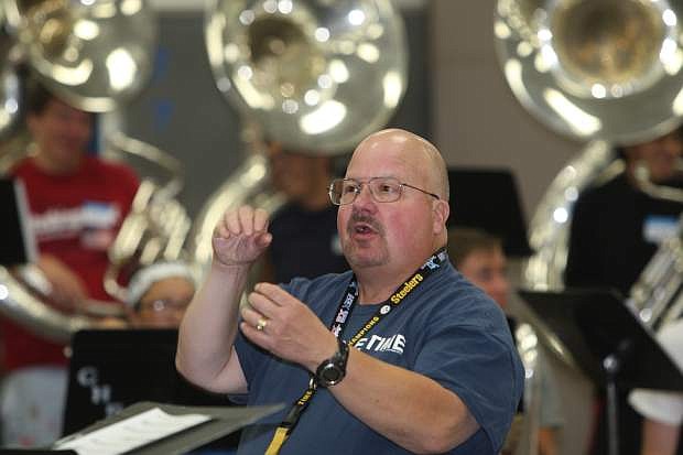 Carson High School band director Bill Zabelsky conducts band camp on Monday.
