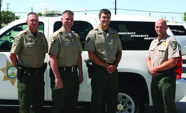 Churchill County Sheriff Ben Trotter, right, stands with the newest reserve deptuies. From left are Jason Stritenberger, Joseph McGowan,  Dusty Casey and Trotter.