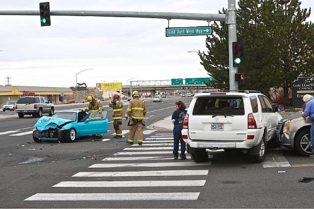 Three cars are involved in an accident at the intersection of E. William and Gold Dust West Way Wednesday around 2pm. At least one person was taken to the hospital.