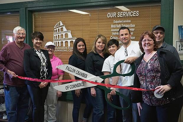 Participating in a ribbon cutting and grand opening for Solomon&#039;s Porch Counseling Center are John Tewell, Natalie Parrish, Ava Case, Katherine Erwin, Tracey Rubio, Lisamarie Favstritsk, John Phipps, Cynthia McGarrah, Paul Herzbrun
