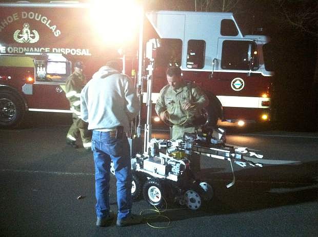 Tahoe Douglas Bomb Squad members work with the bomb robot early Easter morning.