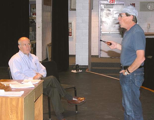 Steve Fraker, left, and Michael Peters rehearse their lines for &quot;Sherlock Hounds &amp; the Upper Crust.&quot;