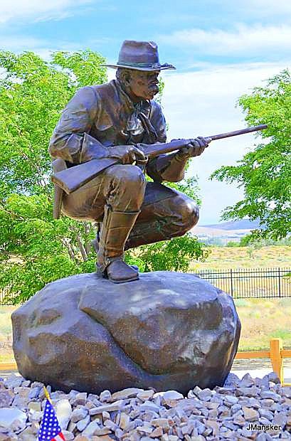 A monument of a cavalry trooper keeps watch on the Northern Nevada Veterans Memorial Cemetery.