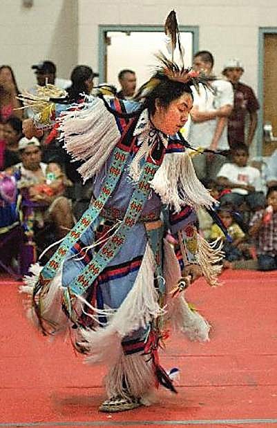 Lonnie Bear performs the Grass Dance as part of a pow wow held at E.C. Best Elementary School in this file photo.
