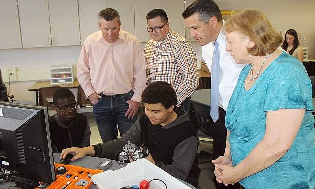 In this 2015 photo, Gov. Brian Sandoval visited Churchill County Middle School to see technolgy in action.From left are trustees Matt Hyde and Greg Koening, Sandoval and Supertintendent Dr. Sandra Sheldon.