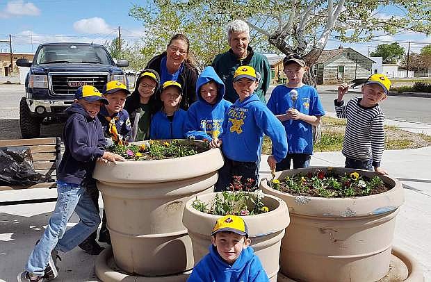 Den1, Pack 38 Cub Scouts planted flowers along Center Street on April 23 with their families. All the flowers where donated by Cub Scouts families