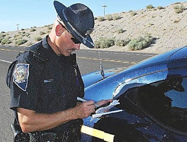 Trooper Tony Hickok enforces the law on U.S. Highway 50 in this file photo.