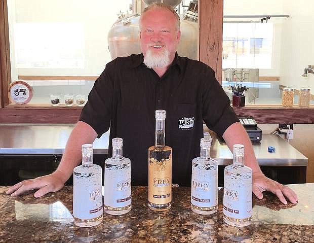 Russell Wedlake of Frey Ranch Estate Disterlly displays the award-winning gin and vodka.