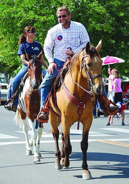 Sen. Dean Heller, R-Nev., and his wife Lynne ride in the annual Lions Club Labor Day Parade.