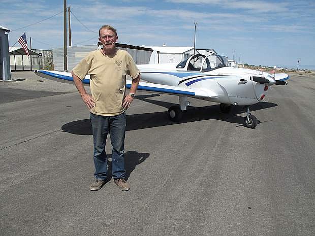 Willie Topken, Fallon pilot and 31-year USAF and Nevada Air Guard veteran, is shown with his single-engine Ercoupe aircraft at Fallon Municipal Airport.