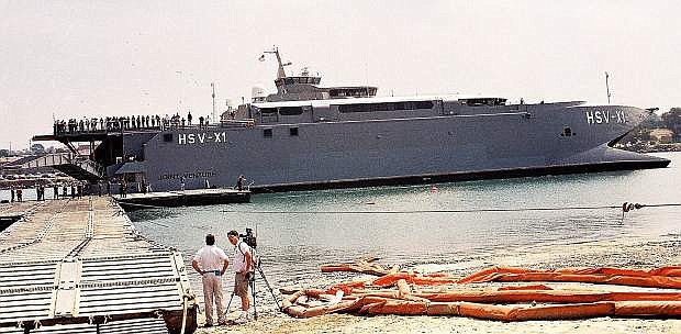 This photo, taken at the San Diego Navy Base in August, 2002, is of the HSV-XI, the first Joint High Speed Vessel that is identical to the USNS Carson City.