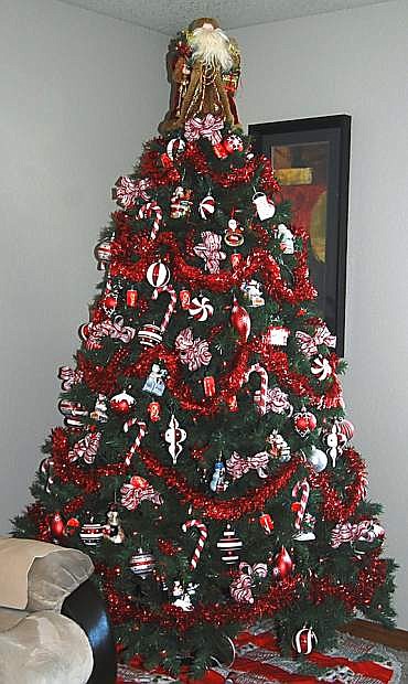 Robby and Candace Johnston show off their Coca-Cola Christmas tree.