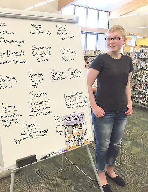 Corinne Ebner. a senior at Churchill County High School, facilitated the library&#039;s Junior Secret Novelist Club.