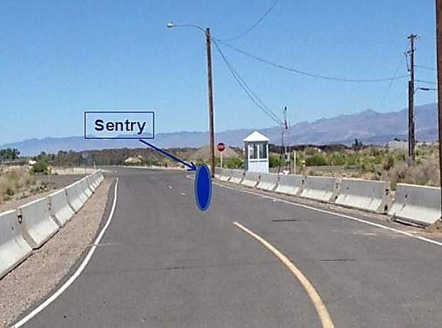 A sentry at the west gate access will check ID credentials of incoming traffic beginning Monday from the center of the road.